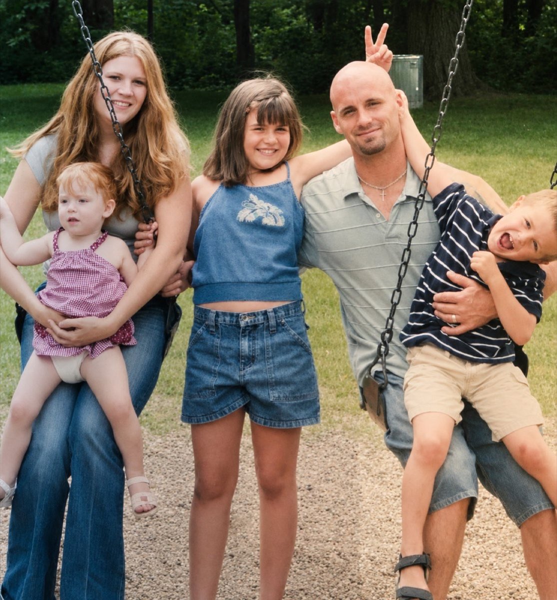 Jill and Aaron with their three children in the early years
